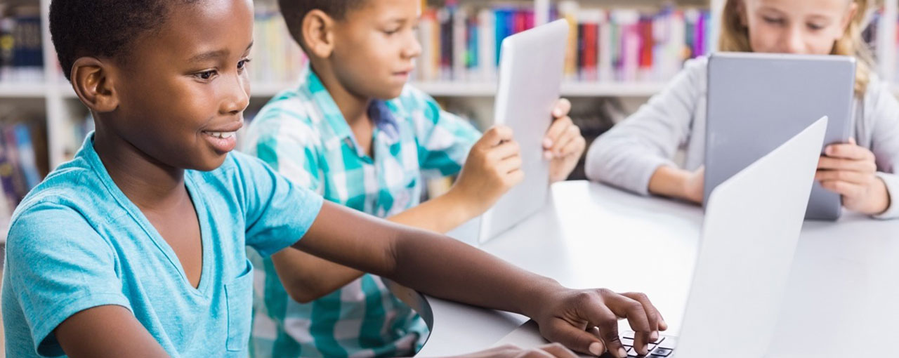 Education students using computers and tablets