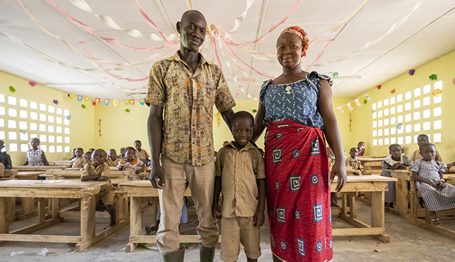 Parents and child in classroom Parents and child in classroom