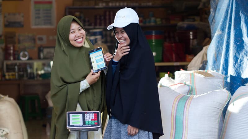 two women smiling two women smiling