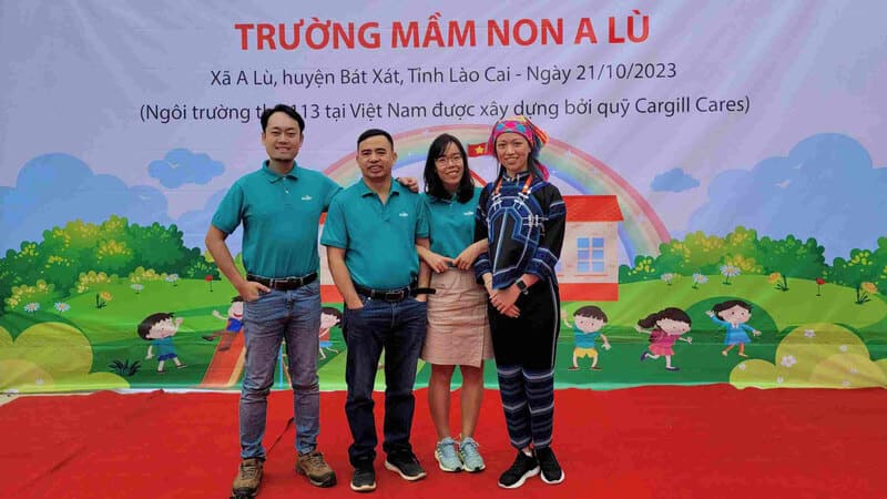 Four Cargill colleagues smile during the recent opening of a new school in Vietnam, built by Cargill volunteers.  Four Cargill colleagues smile during the recent opening of a new school in Vietnam, built by Cargill volunteers.