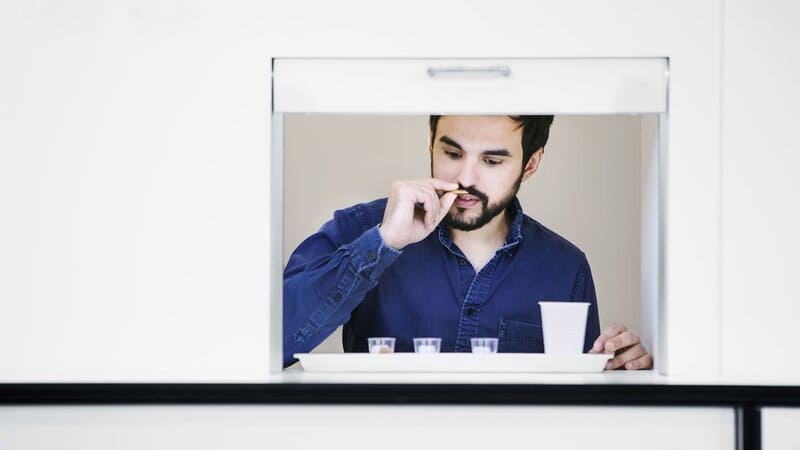 A man smells a piece of chocolate at Cargill’s House of Chocolate in Belgium. A man smells a piece of chocolate at Cargill’s House of Chocolate in Belgium.