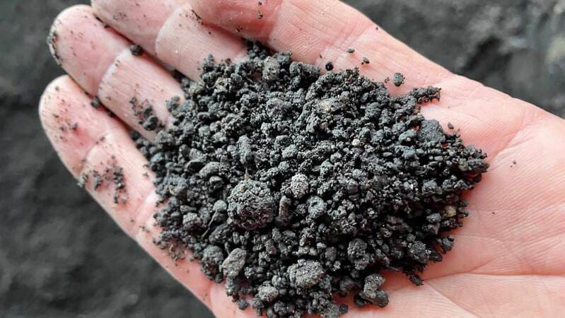 A farmer flies a drone on a cattle feedlot in Brazil. A farmer flies a drone on a cattle feedlot in Brazil.