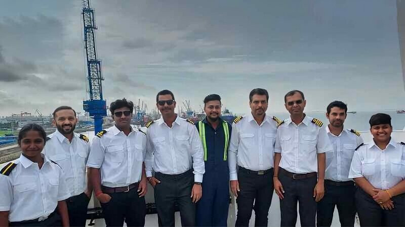 A group of ship officers on the deck of the Pyxis Ocean.  A group of ship officers on the deck of the Pyxis Ocean.